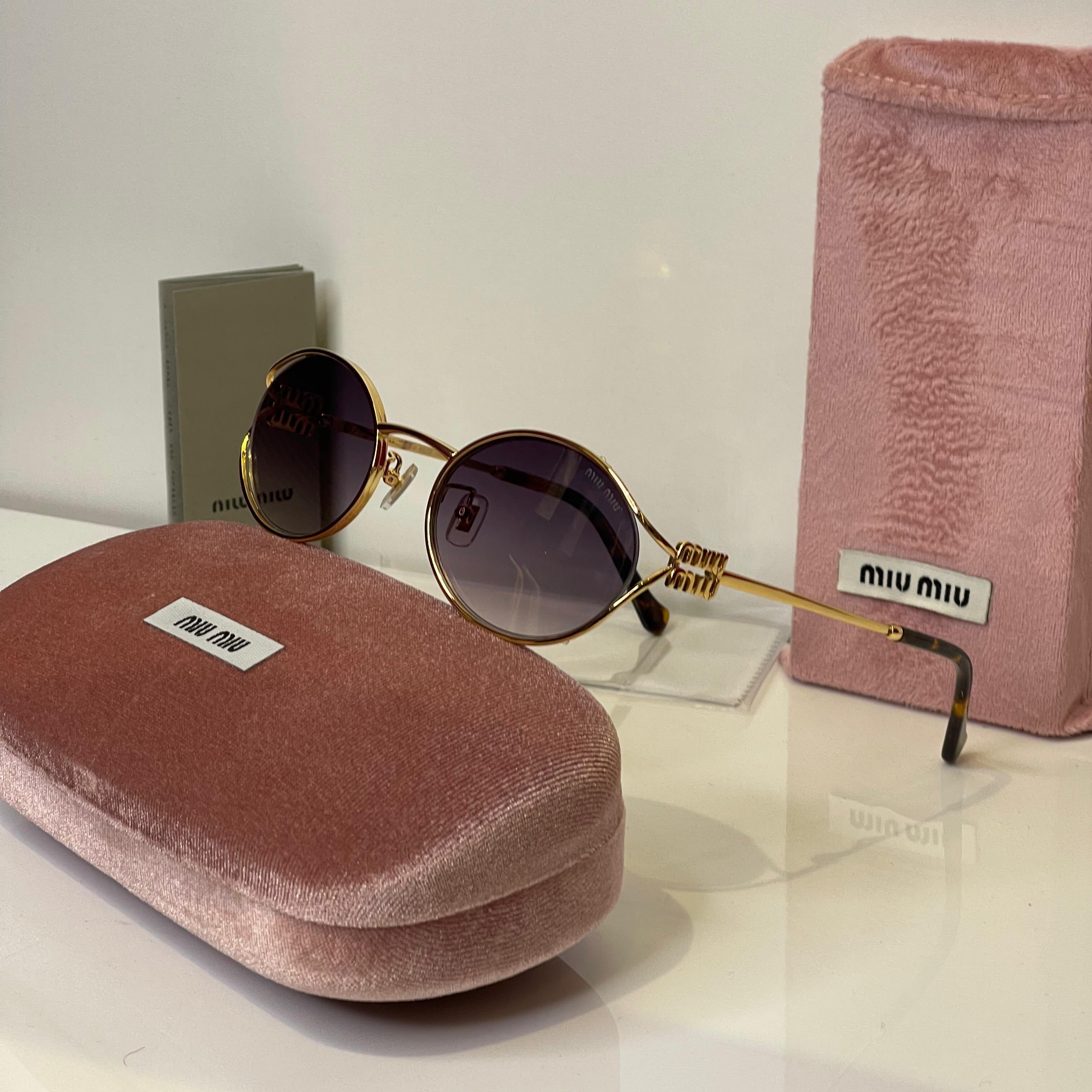 Miu Miu Round Gold Frame Sunglasses