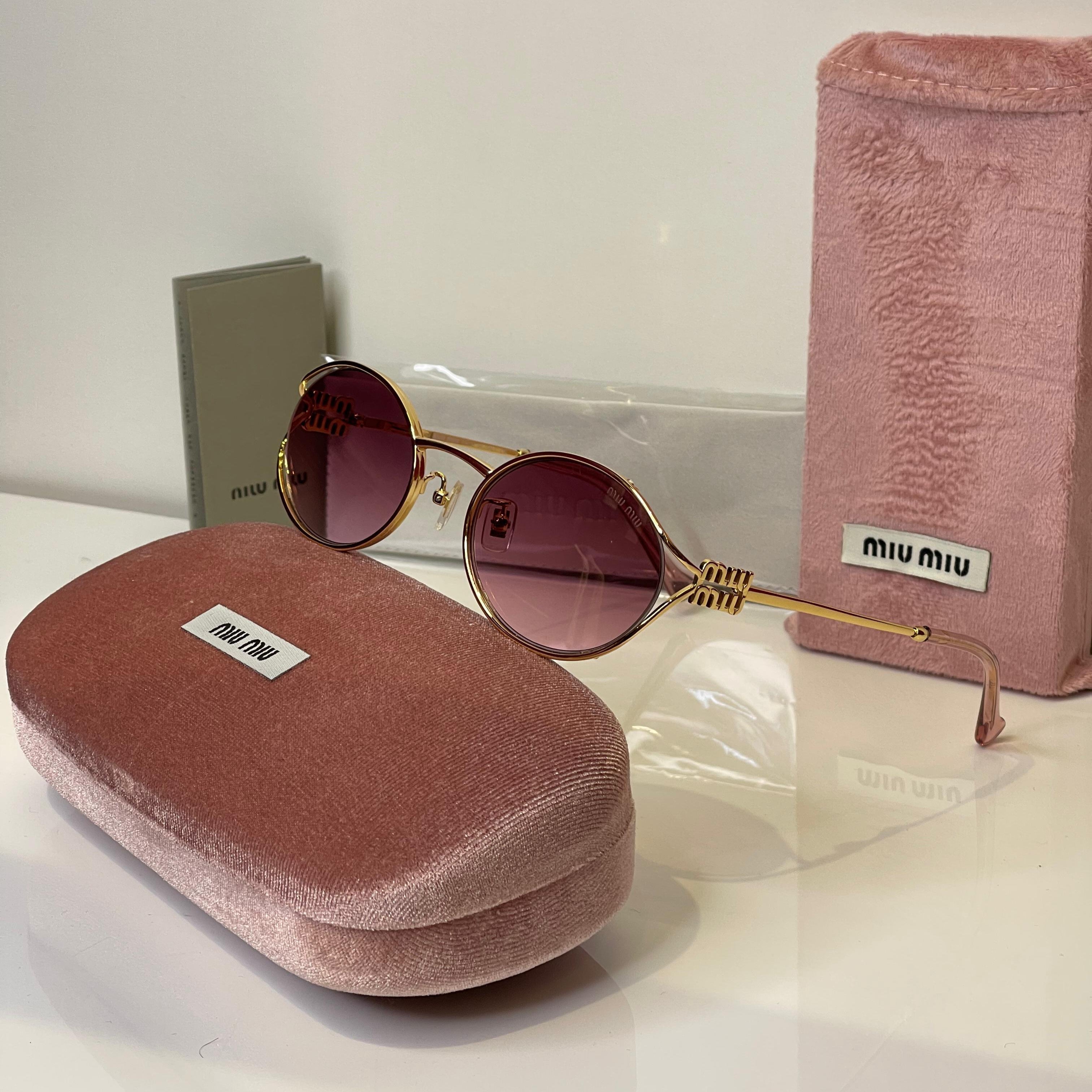 Miu Miu Round Gold Frame Sunglasses