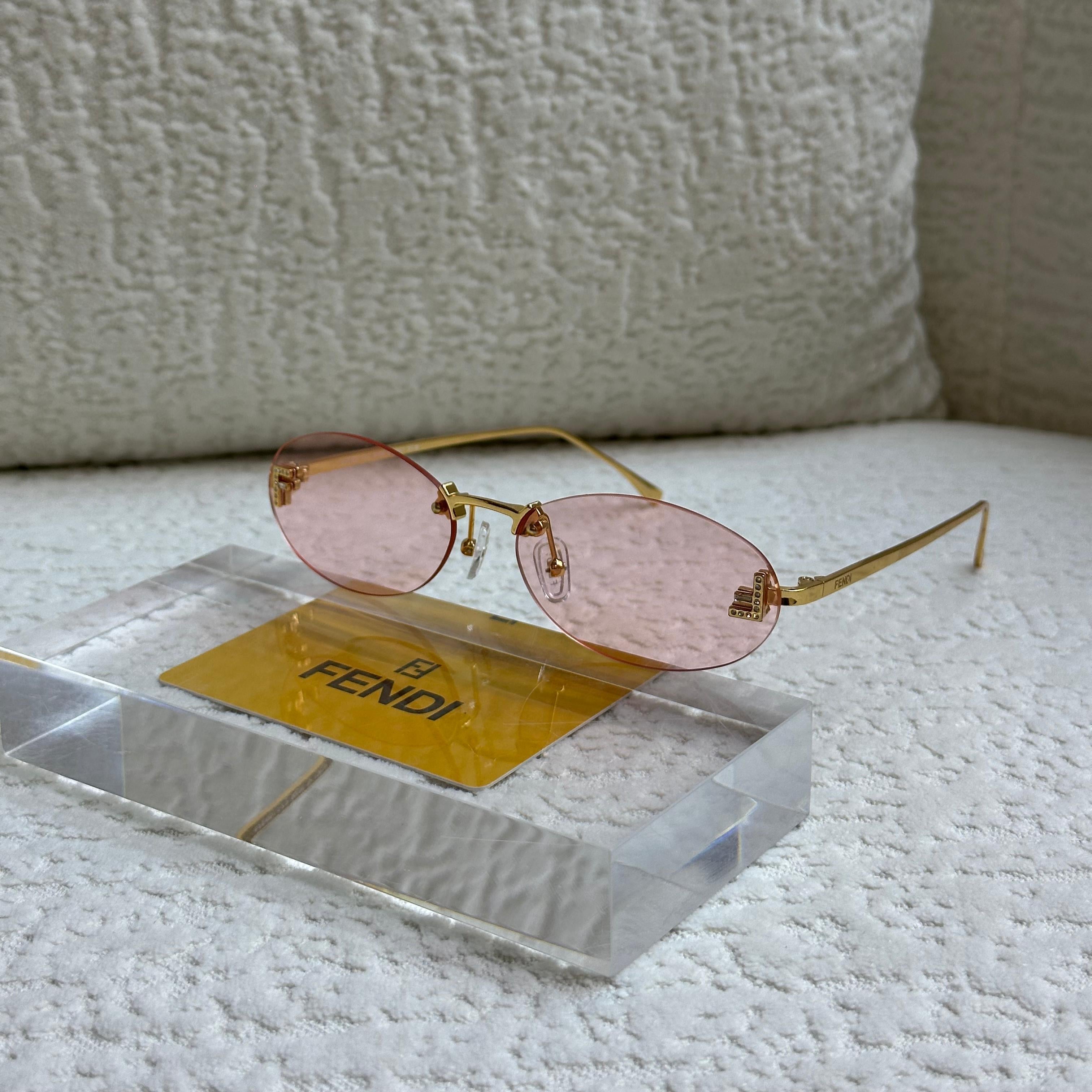 Fendi FE40025U Rimless Oval Sunglasses