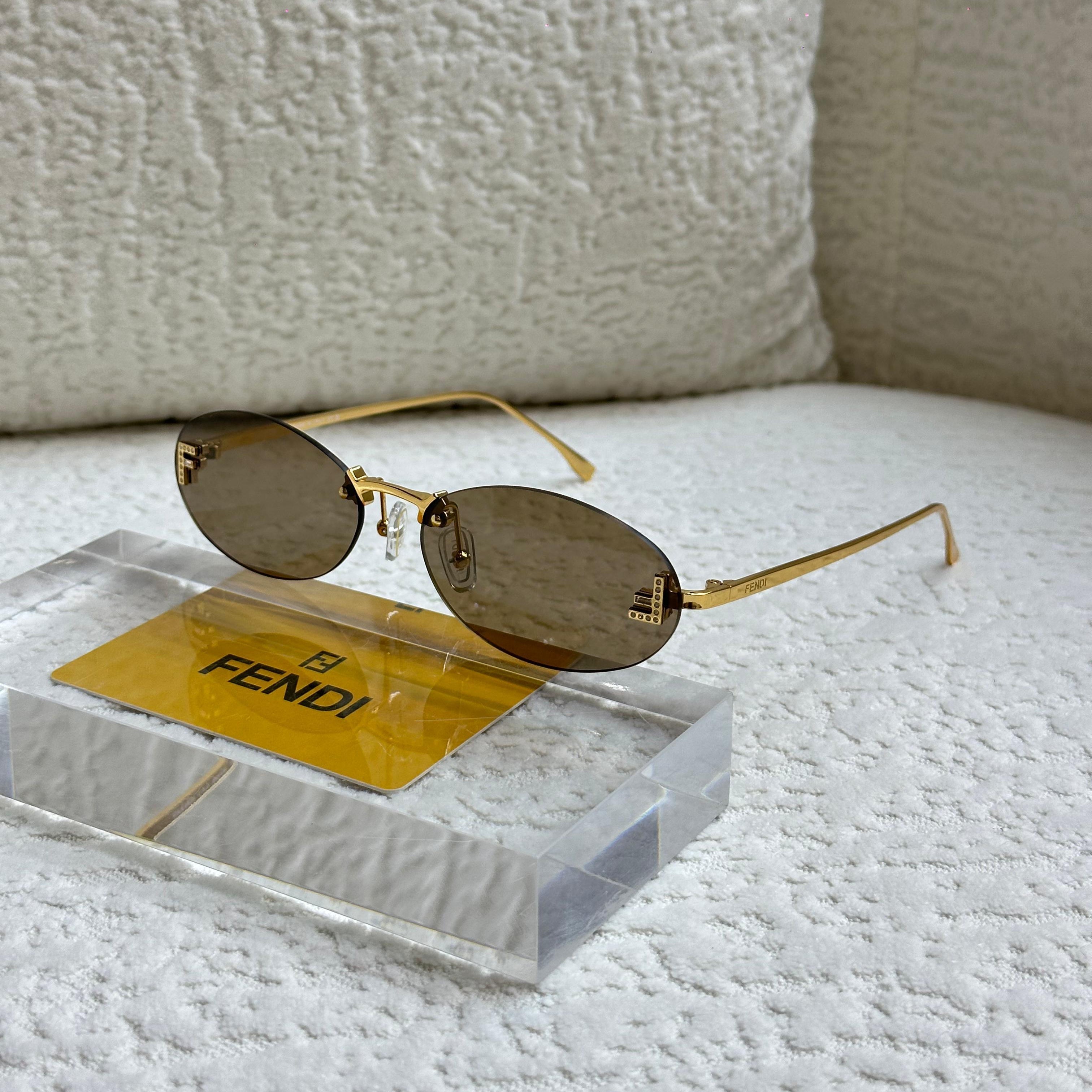 Fendi FE40025U Rimless Oval Sunglasses
