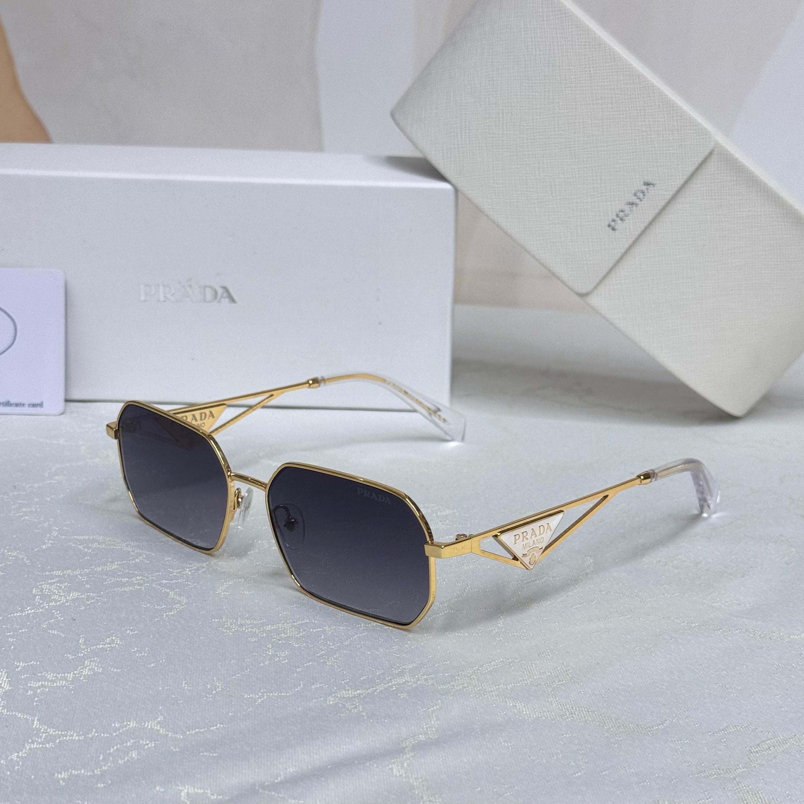 Prada Minimal Rimless Sunglasses – PR 64TS Style