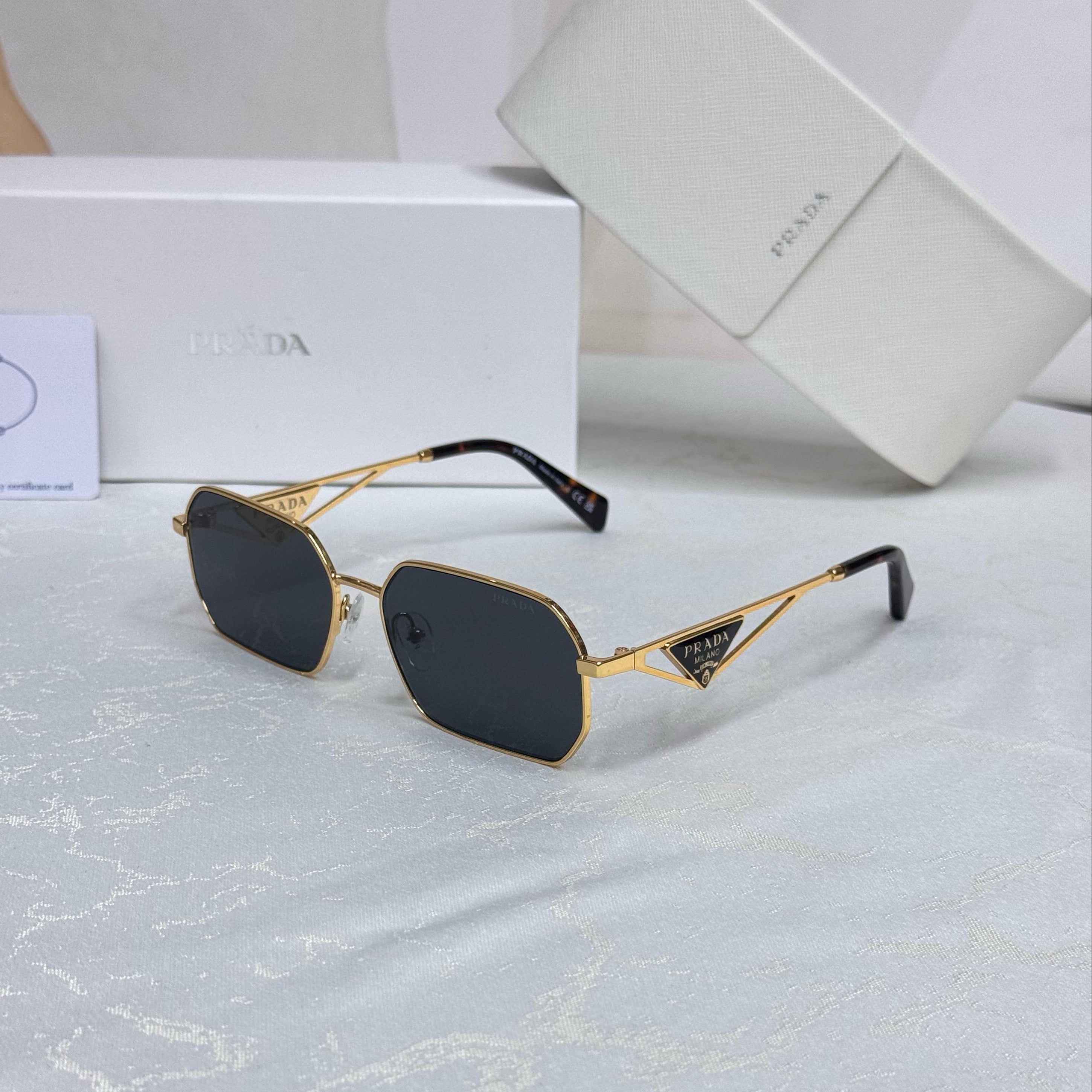 Prada Minimal Rimless Sunglasses – PR 64TS Style