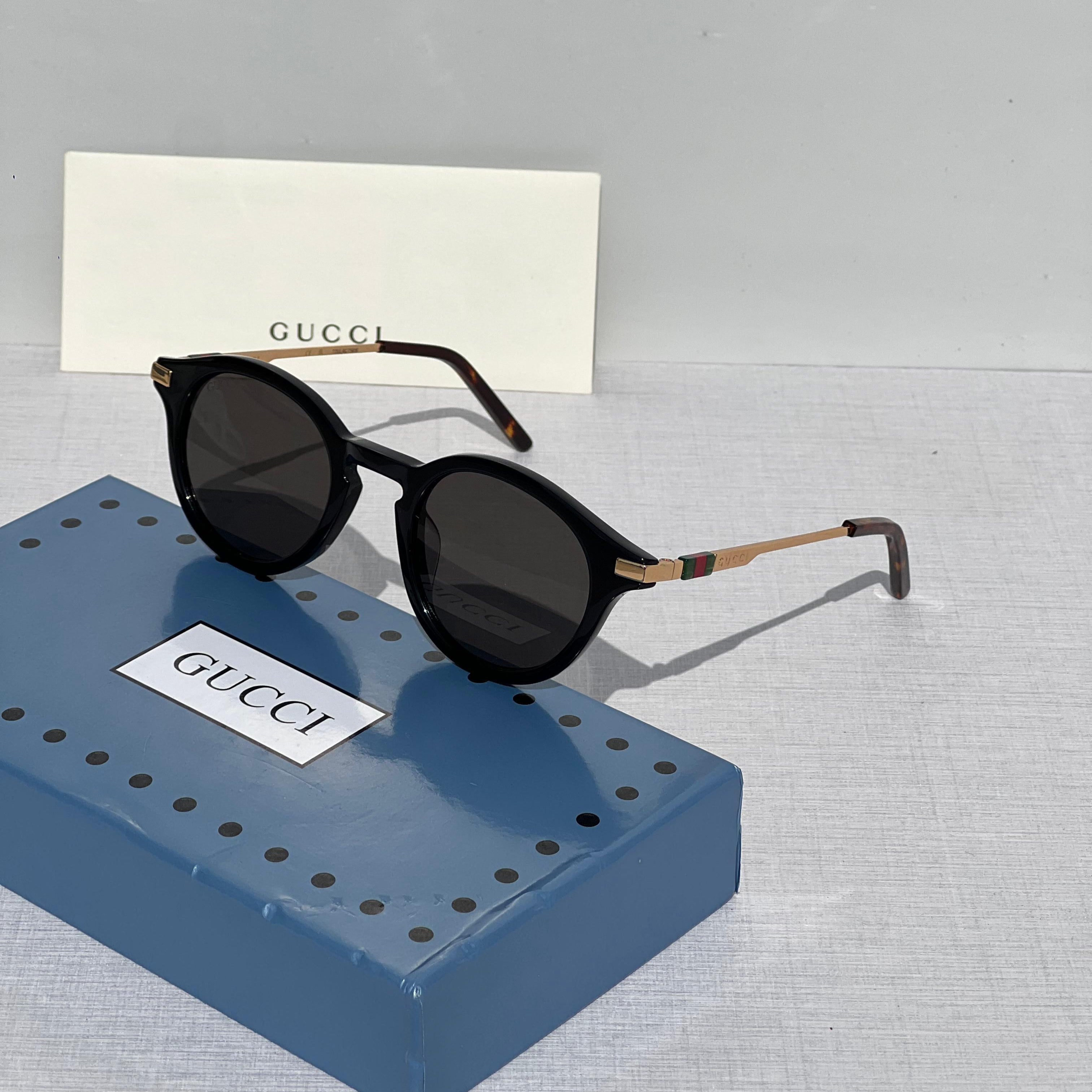 Gucci GG0061S Round Havana Sunglasses