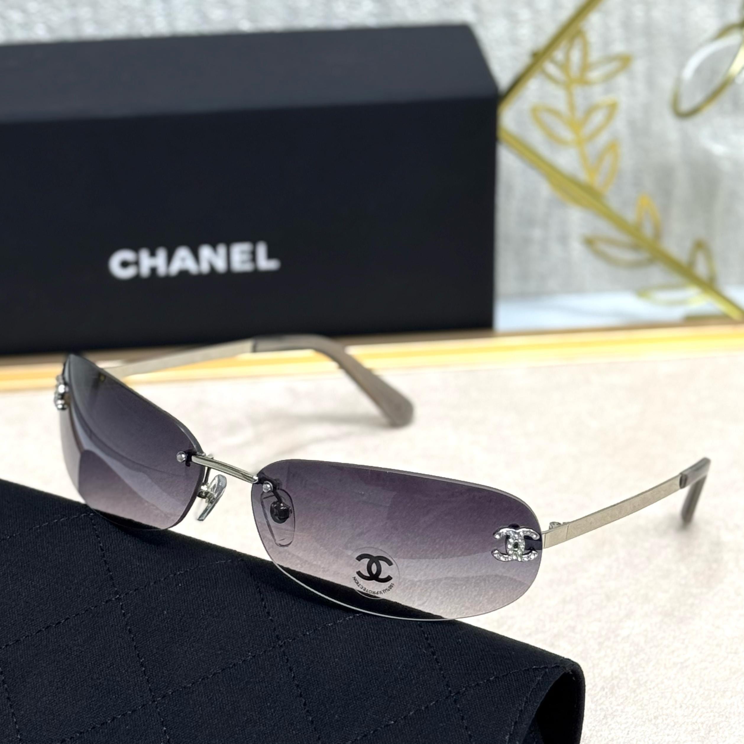 Chanel Butterfly Rimless Sunglasses