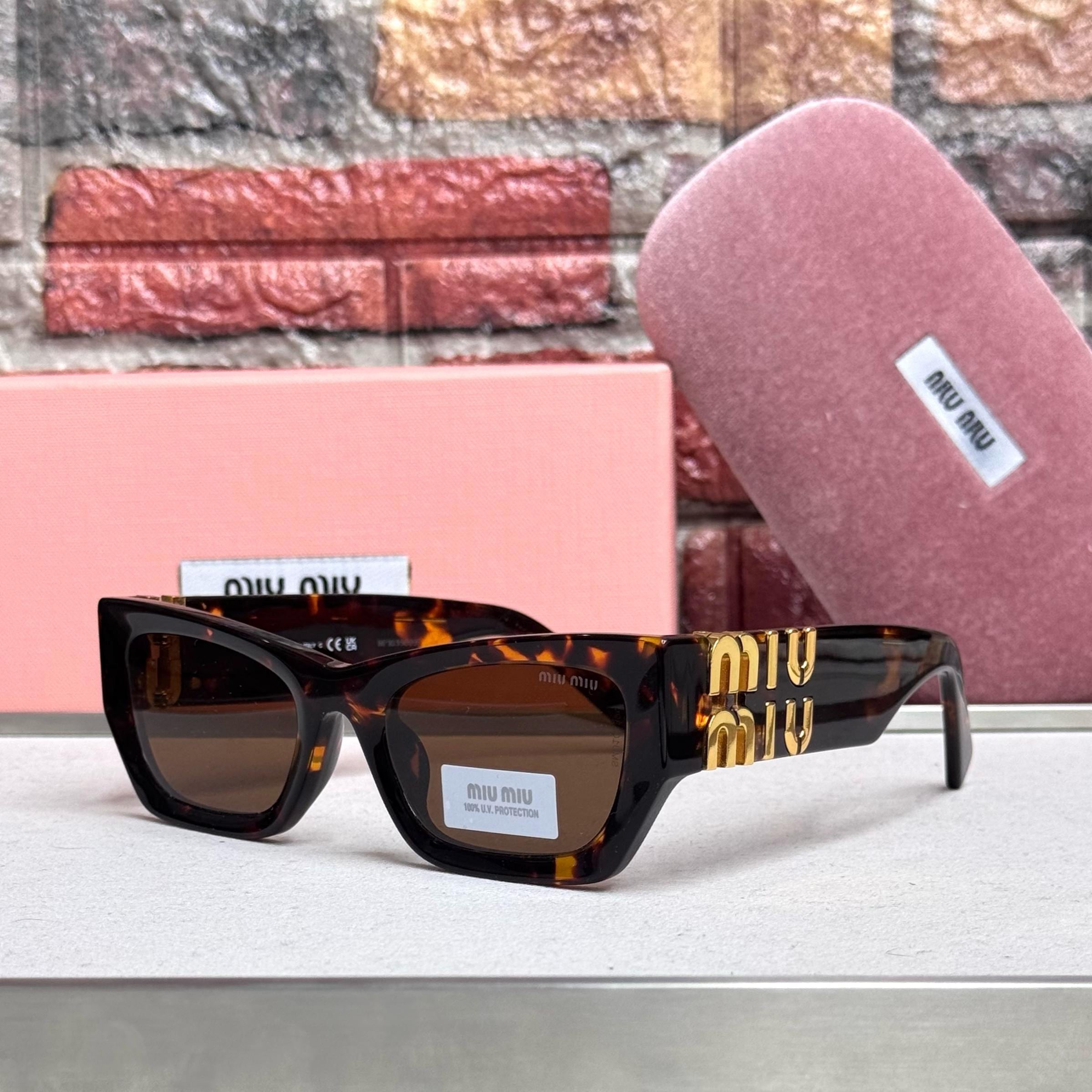 Miu Miu Rectangle Sunglasses