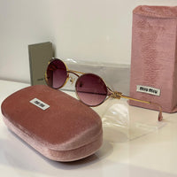 Miu Miu Round Gold Frame Sunglasses