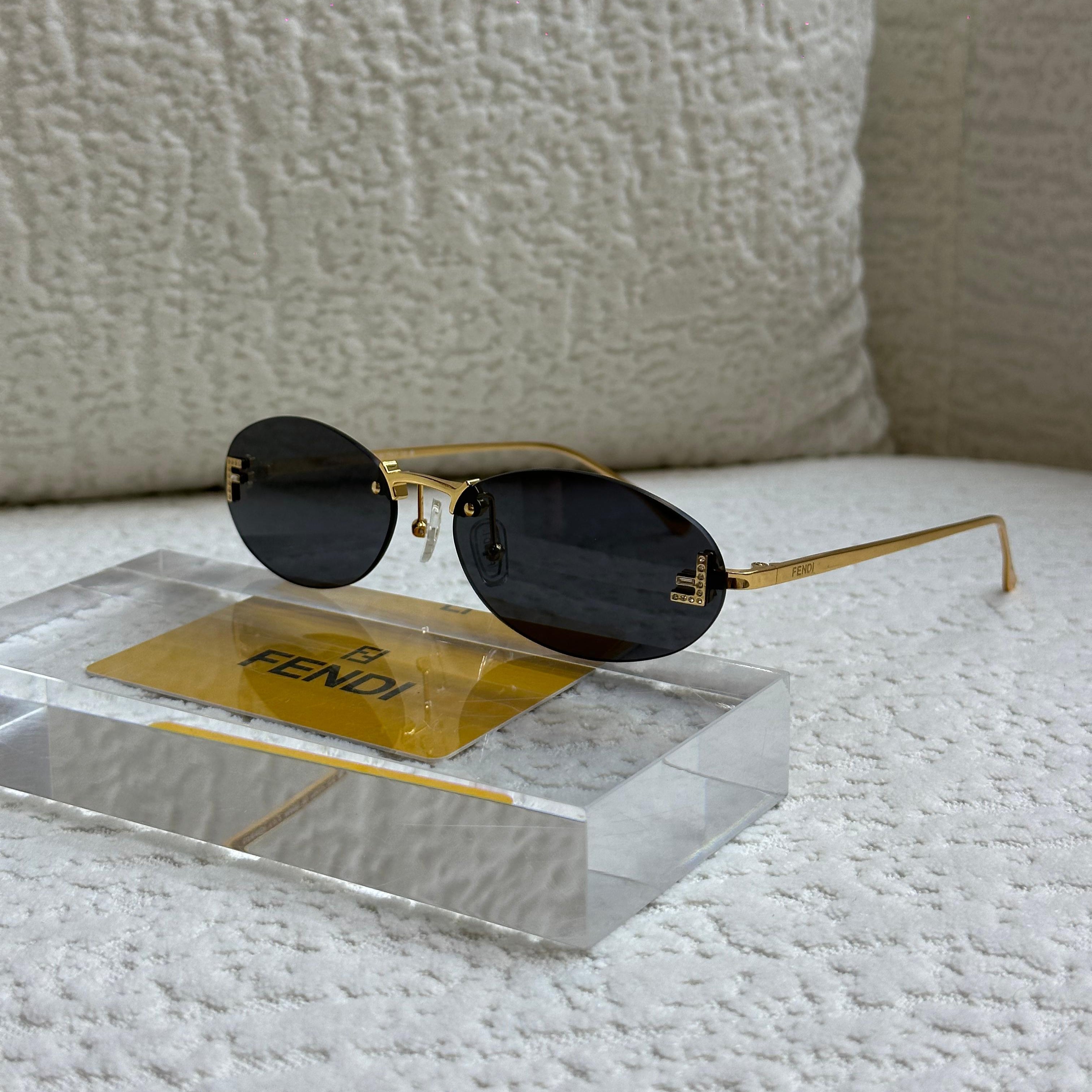 Fendi FE40025U Rimless Oval Sunglasses