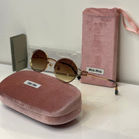 Miu Miu Round Gold Frame Sunglasses