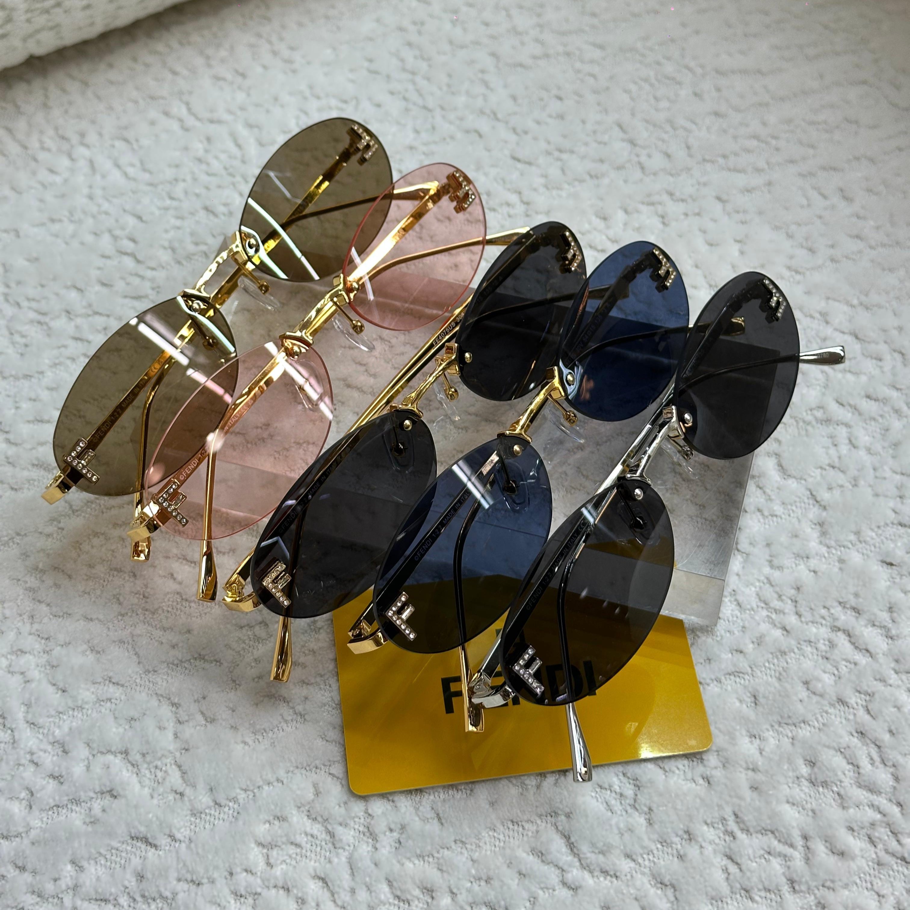 Fendi FE40025U Rimless Oval Sunglasses