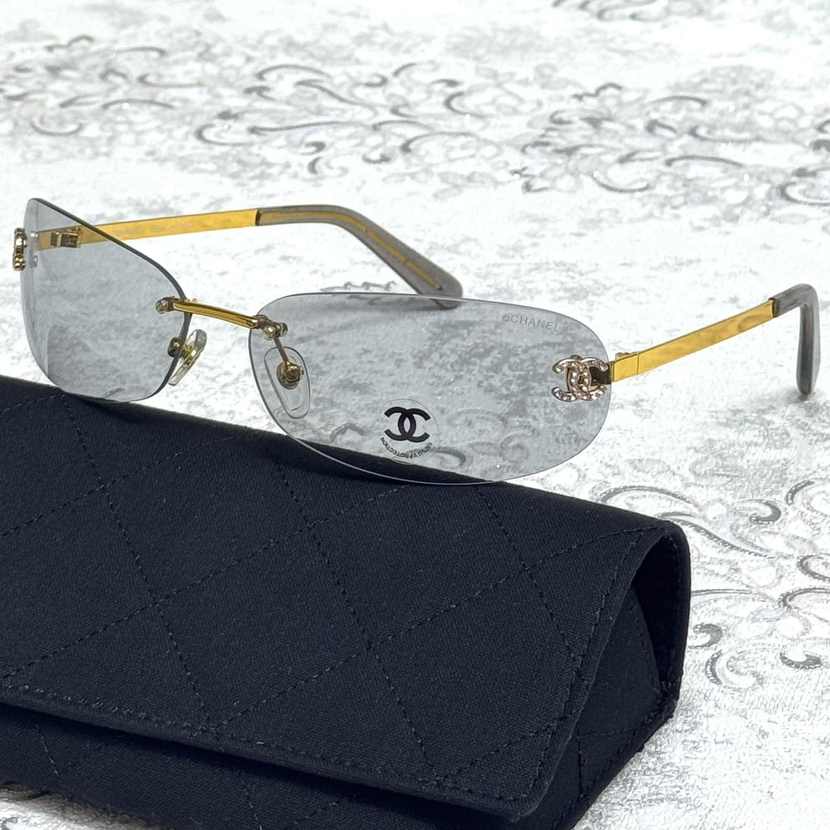 Chanel Butterfly Rimless Sunglasses