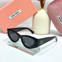 Miu Miu Cat-Eye Sunglasses