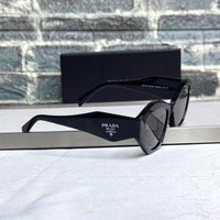 Prada Oversized Curved Cat-Eye Sunglasses – PR 08YS Style