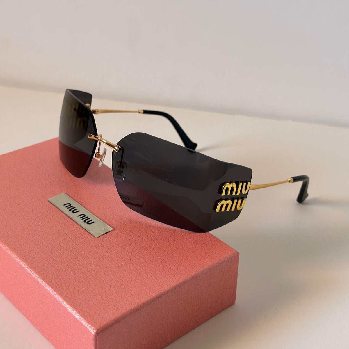 Miu Miu MU 10WS Rimless Shield Sunglasses