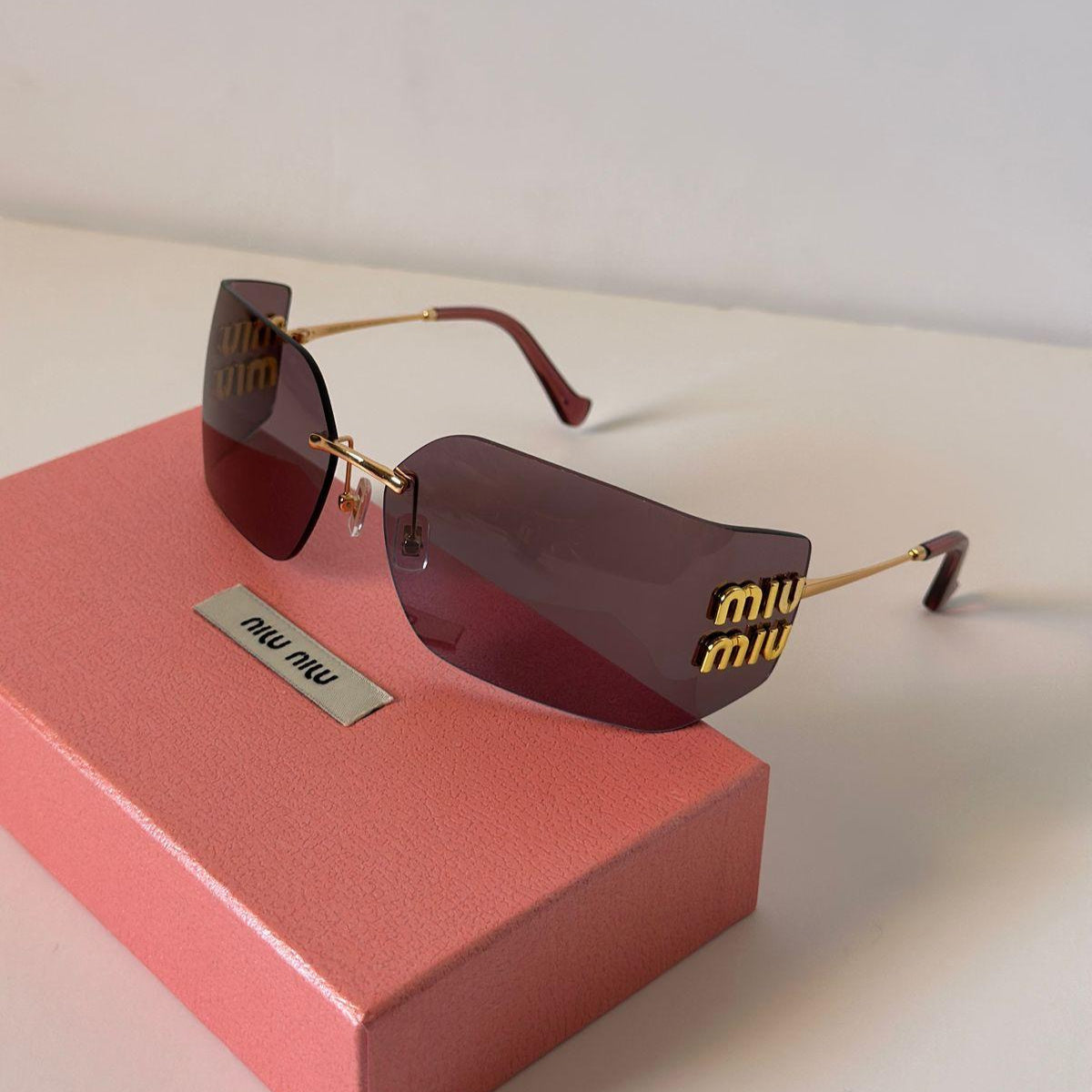 Miu Miu MU 10WS Rimless Shield Sunglasses